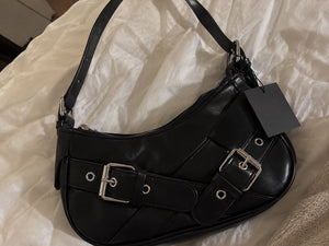 Cartera Raven